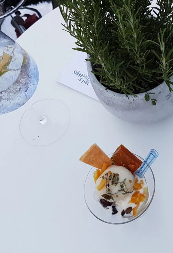 A scoop of Gin Mare & Tonic sorbet with bespoke toppings on the rooftop of the Hoxton Hotel 