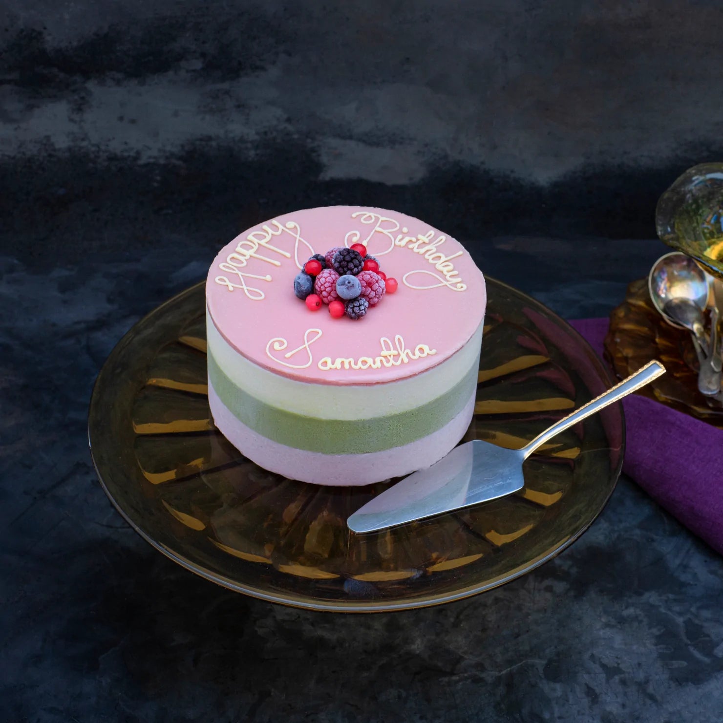 Bespoke ice cream cake with writing in chocolate and British frozen fruits decoration