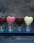 Large assorted heart-shaped ice creams on sticks