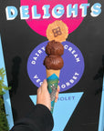 Two scoops of Belgian Chocolate Ice Cream on a cone
