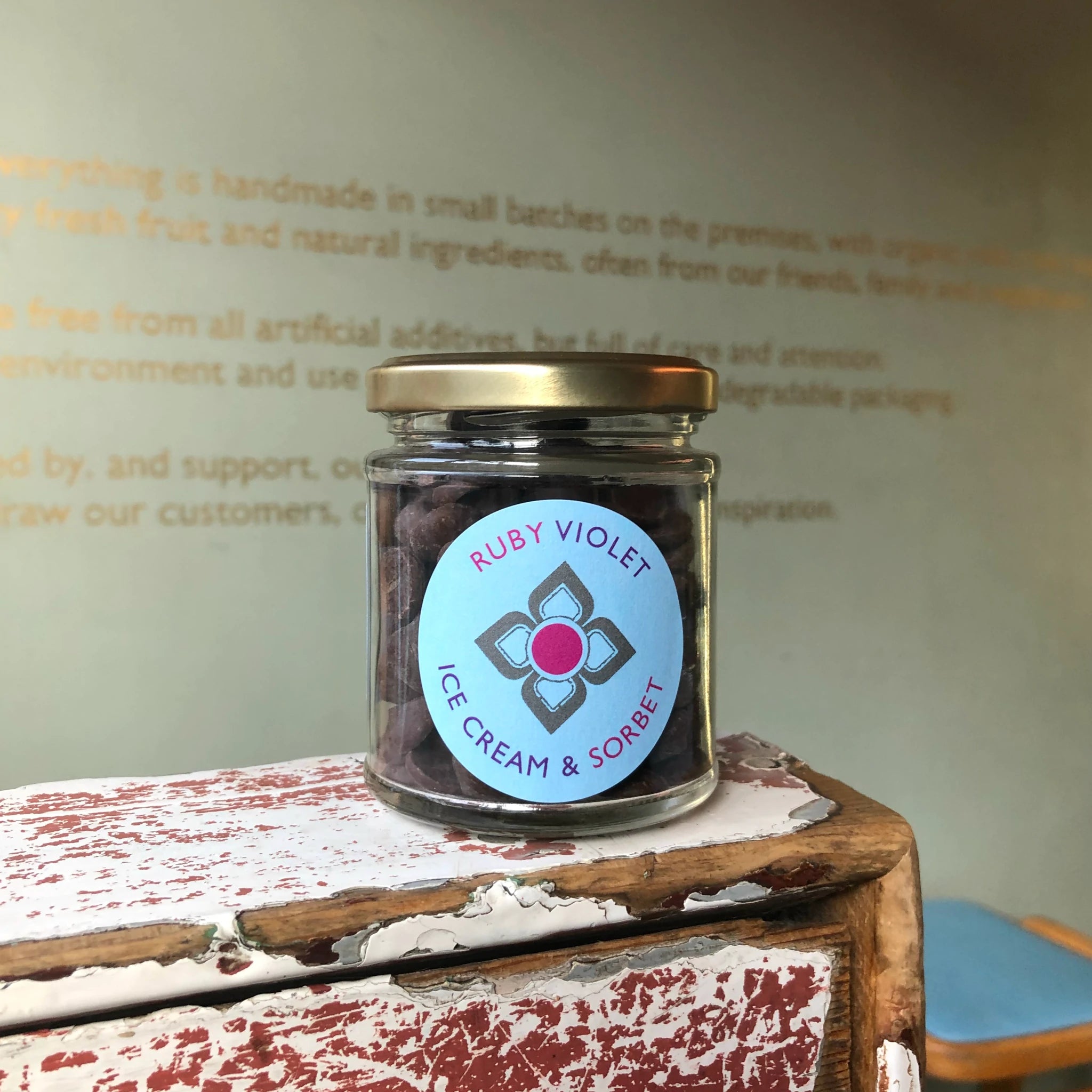 A jar full of chocolate callets to make two hot chocolates