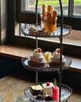 Ice Cream afternoon tea with savoury items and ice cream cakes on a tiered stand