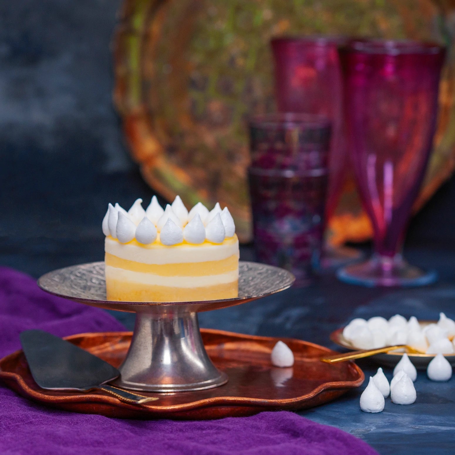 Lemon tart decorated with meringues