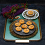 Handmade Frangipane topped minced pies on a tray