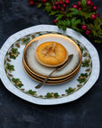 A francipane topped mince pie on a plate
