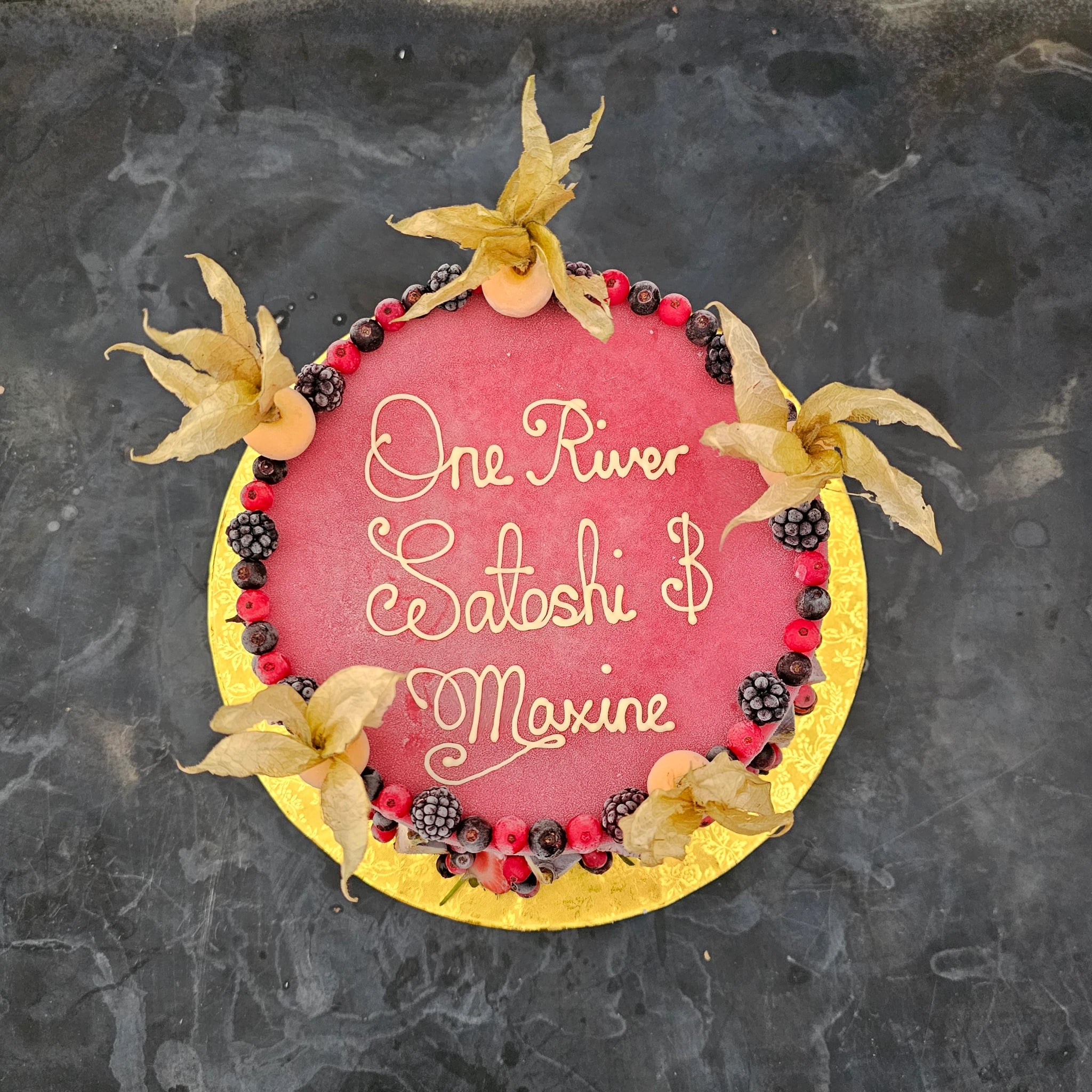 Bespoke ice cream cake with chocolate writing and exotic fruits decoration