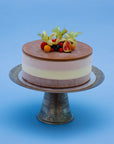 Miss Mabel ice cream cake decorated with frozen berries and exotic fruits