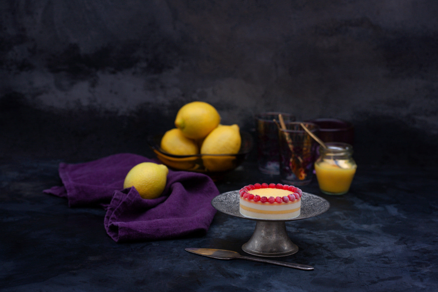 Ice cream lemon tart decorated with redcurrants