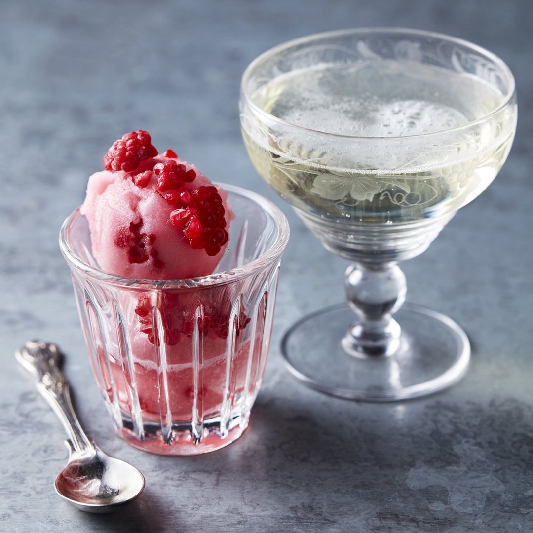 Raspberry, Rosewater &amp; Prosecco sorbet served with a glass of prosecco